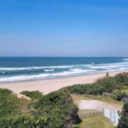 Indigo Bay 25 is a luxury, self-catering, 4 bedroom, 8 sleeper on the Manaba beachfront with stunning sea views from Lucien Beach to Margate Beach on the South Coast of KwaZulu Natal.