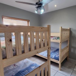 Indigo Bay 25 is a luxury, self-catering, 4 bedroom, 8 sleeper on the Manaba beachfront with stunning sea views from Lucien Beach to Margate Beach on the South Coast of KwaZulu Natal.