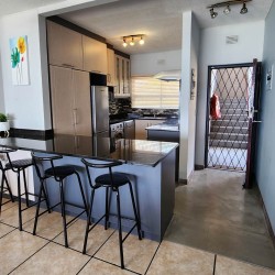 Sue Casa 10 is a family holiday flat opposite the Lucien Beach tidal pool in Manaba Beach on the KZN South Coast.