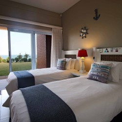 Balooga 1 is ground floor, luxury 7 Sleeper, self-catering apartment on Margate seafront on the South Coast KwaZulu of Natal - Happy Holiday Homes.