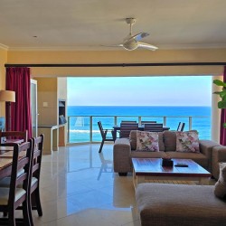 Lucien Sands 601 is a seafront self-catering penthouse with a 180º breaker sea view & a swimming pool, you can walk onto Lucien Blue Flag Beach & Margate beach from the 5th floor apartment.