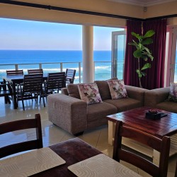 Lucien Sands 601 is a seafront self-catering penthouse with a 180º breaker sea view & a swimming pool, you can walk onto Lucien Blue Flag Beach & Margate beach from the 5th floor apartment.