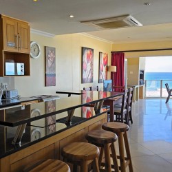 Lucien Sands 601 is a seafront self-catering penthouse with a 180º breaker sea view & a swimming pool, you can walk onto Lucien Blue Flag Beach & Margate beach from the 5th floor apartment.