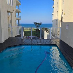 Lucien Sands 601 is a seafront self-catering penthouse with a 180º breaker sea view & a swimming pool, you can walk onto Lucien Blue Flag Beach & Margate beach from the 5th floor apartment.