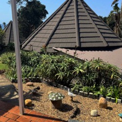 Banana Beach Club F1, a self-catering ground-floor studio in Melville on the Hibiscus Coast, located 50m from the beach, ideal for a small family holiday.