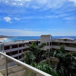 Santorini 102 B is a 6-sleeper self-catering holiday apartment in Margate with a beautiful sea view, ideal holiday accommodation for couples and families on the South Coast of KwaZulu Natal in South Africa.
