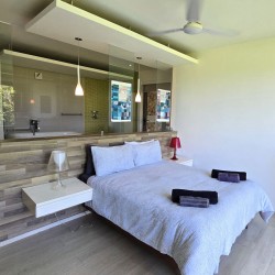 Strachan 2127 is a luxury holiday home in Ramsgate, located on the beachfront of Ramsgate Beach. This stunning sea-view rental in KwaZulu-Natal offers breathtaking ocean views, an infinity pool, and modern comforts—making it the perfect family-friendly getaway in South Africa.
