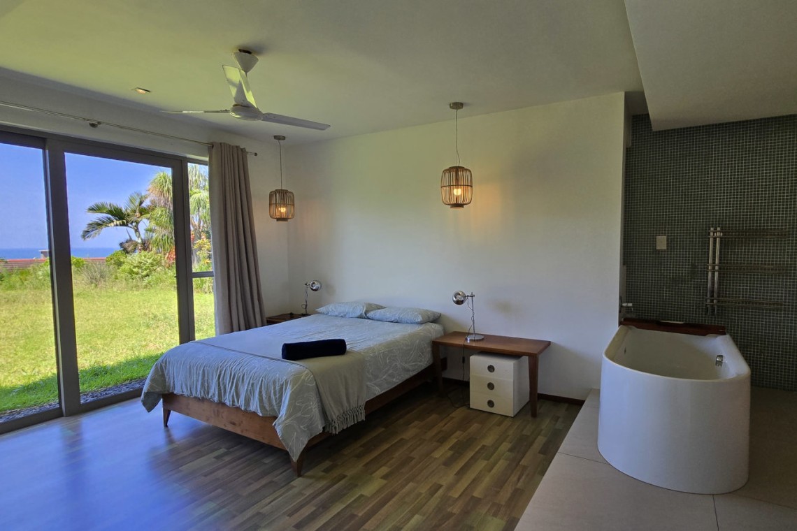Strachan 2127 is a luxury holiday home in Ramsgate, located on the beachfront of Ramsgate Beach. This stunning sea-view rental in KwaZulu-Natal offers breathtaking ocean views, an infinity pool, and modern comforts—making it the perfect family-friendly getaway in South Africa.