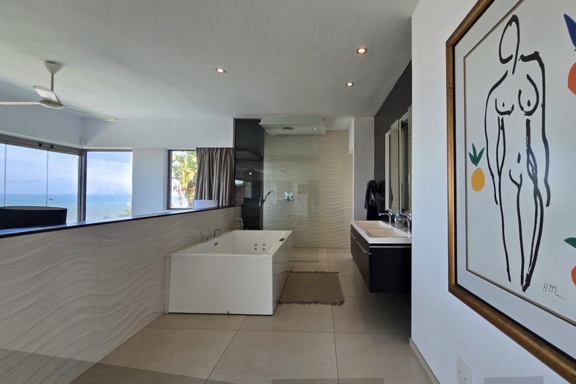 Strachan 2127 is a luxury holiday home in Ramsgate, located on the beachfront of Ramsgate Beach. This stunning sea-view rental in KwaZulu-Natal offers breathtaking ocean views, an infinity pool, and modern comforts—making it the perfect family-friendly getaway in South Africa.