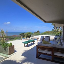 Strachan 2127 is a luxury holiday home in Ramsgate, located on the beachfront of Ramsgate Beach. This stunning sea-view rental in KwaZulu-Natal offers breathtaking ocean views, an infinity pool, and modern comforts—making it the perfect family-friendly getaway in South Africa.