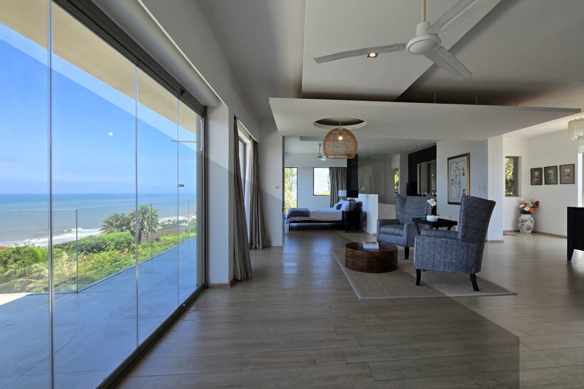 Strachan 2127 is a luxury holiday home in Ramsgate, located on the beachfront of Ramsgate Beach. This stunning sea-view rental in KwaZulu-Natal offers breathtaking ocean views, an infinity pool, and modern comforts—making it the perfect family-friendly getaway in South Africa.