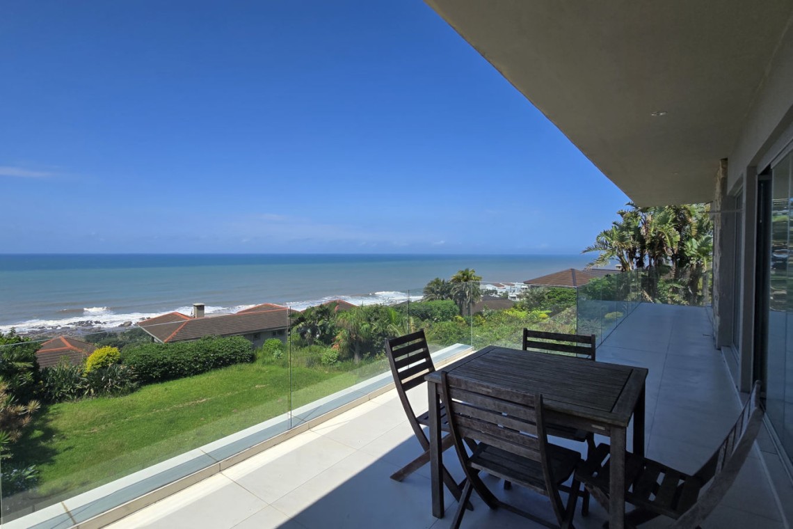 Strachan 2127 is a luxury holiday home in Ramsgate, located on the beachfront of Ramsgate Beach. This stunning sea-view rental in KwaZulu-Natal offers breathtaking ocean views, an infinity pool, and modern comforts—making it the perfect family-friendly getaway in South Africa.