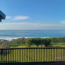Sea Park House is a beachfront holiday home Sea Park offering self-catering accommodation South Coast, a large family beach house KwaZulu-Natal with sea view and group accommodation on the beach.
