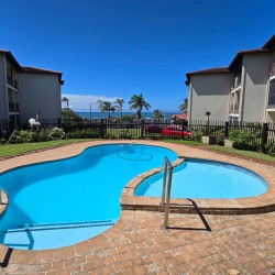 The two communal swimming pools at Topanga 25 in Topanga Uvongo complex—walk to Uvongo beach from this affordable holiday accommodation in Uvongo.