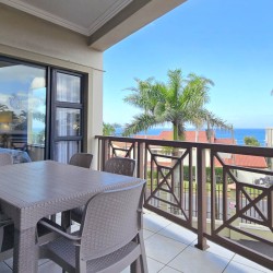 Topanga 25 patio – secure, sea facing 6 sleeper in Uvongo. Affordable holiday accommodation in Uvongo near the beach and shops.