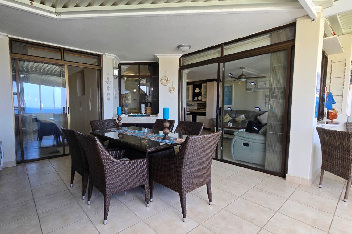 The dining area on the enclosed patio at Chardonnay Cabanas 5