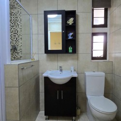 Second bathroom at Chardonnay Cabanas 5 with shower and toilet