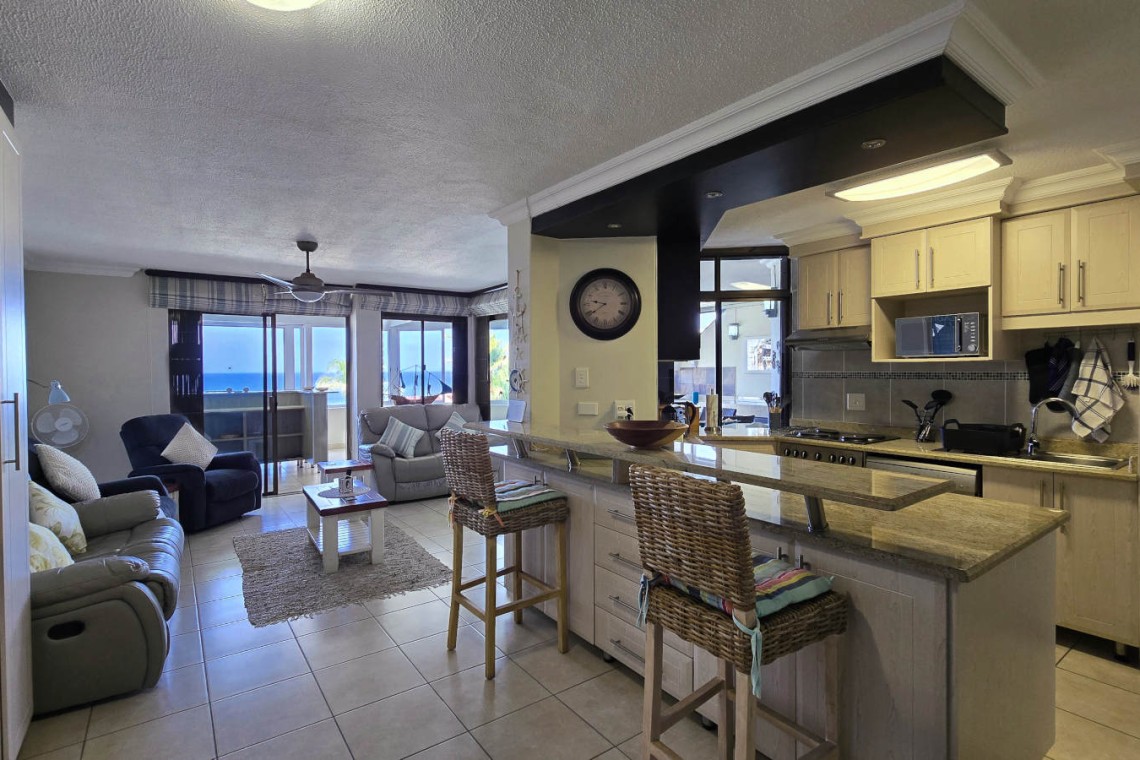 Open plan lounge with sea view at Chardonnay Cabanas 5