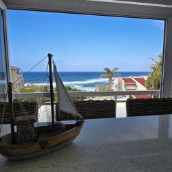 Sea view overlooking Uvongo Beach from the bar in Chardonnay Cabanas 5 patio