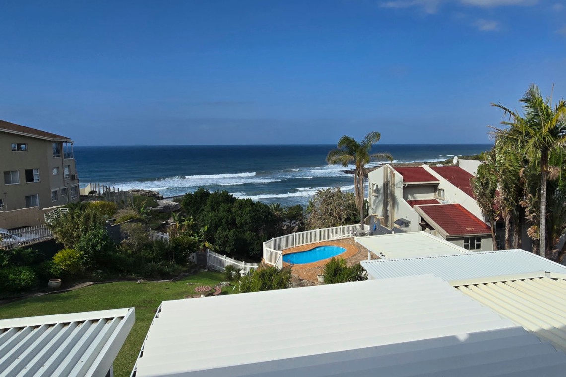 Sea view overlooking Uvongo Beach from Chardonnay Cabanas 5 patio