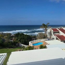 Sea view overlooking Uvongo Beach from Chardonnay Cabanas 5 patio