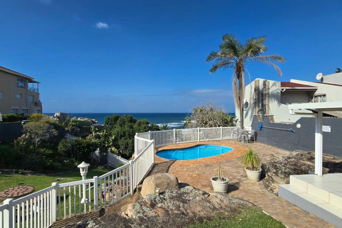 Swimming pool and direct beach gate access at Chardonnay Cabanas 5