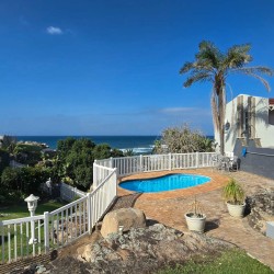 Swimming pool and direct beach gate access at Chardonnay Cabanas 5