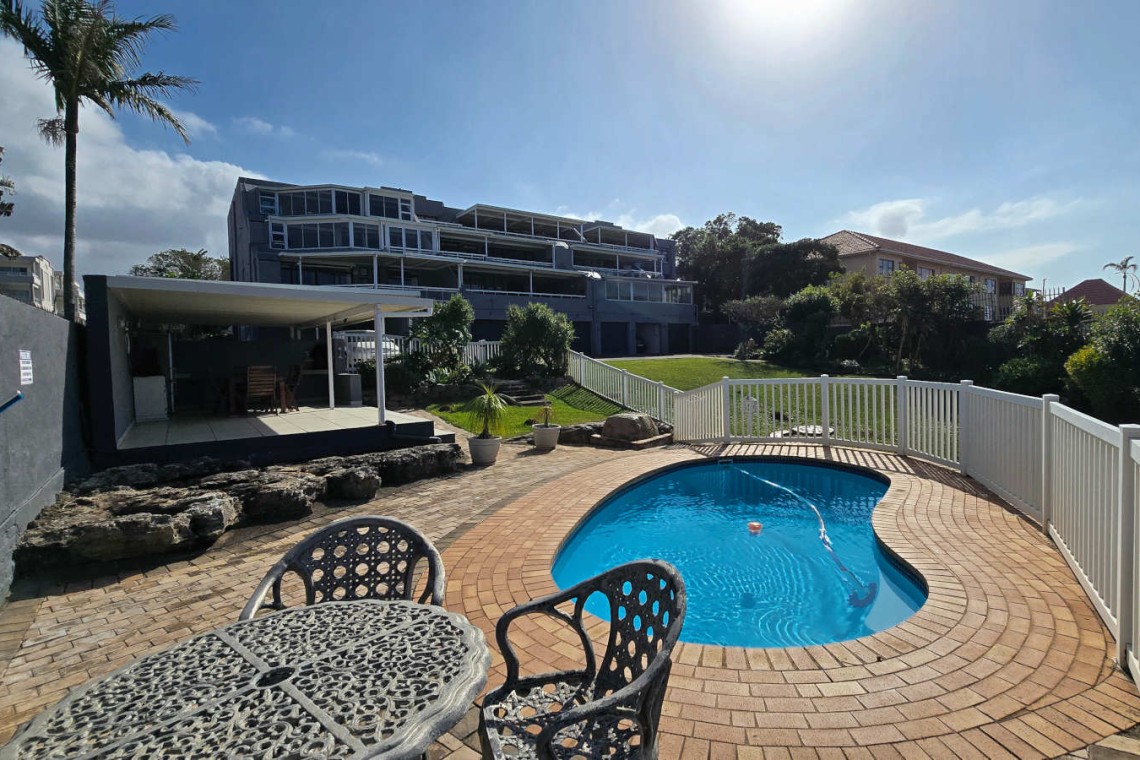 Gaze over the pool at Chardonnay Cabanas 5