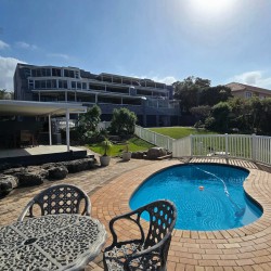 Gaze over the pool at Chardonnay Cabanas 5