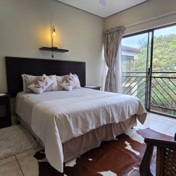 Queen bedroom with en-suite at Portofino 15 Shelly Beach