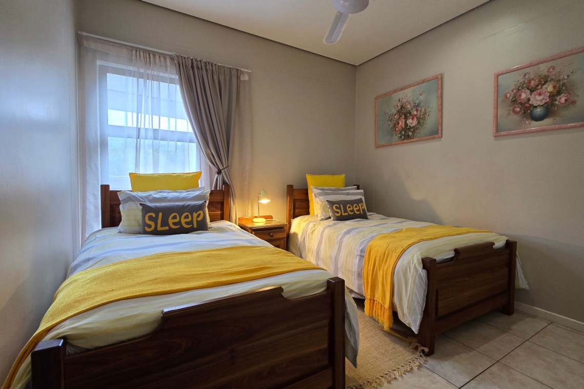 The third bedroom at Portofino 15 in Shelly Beach is perfect for the kids with two single beds.